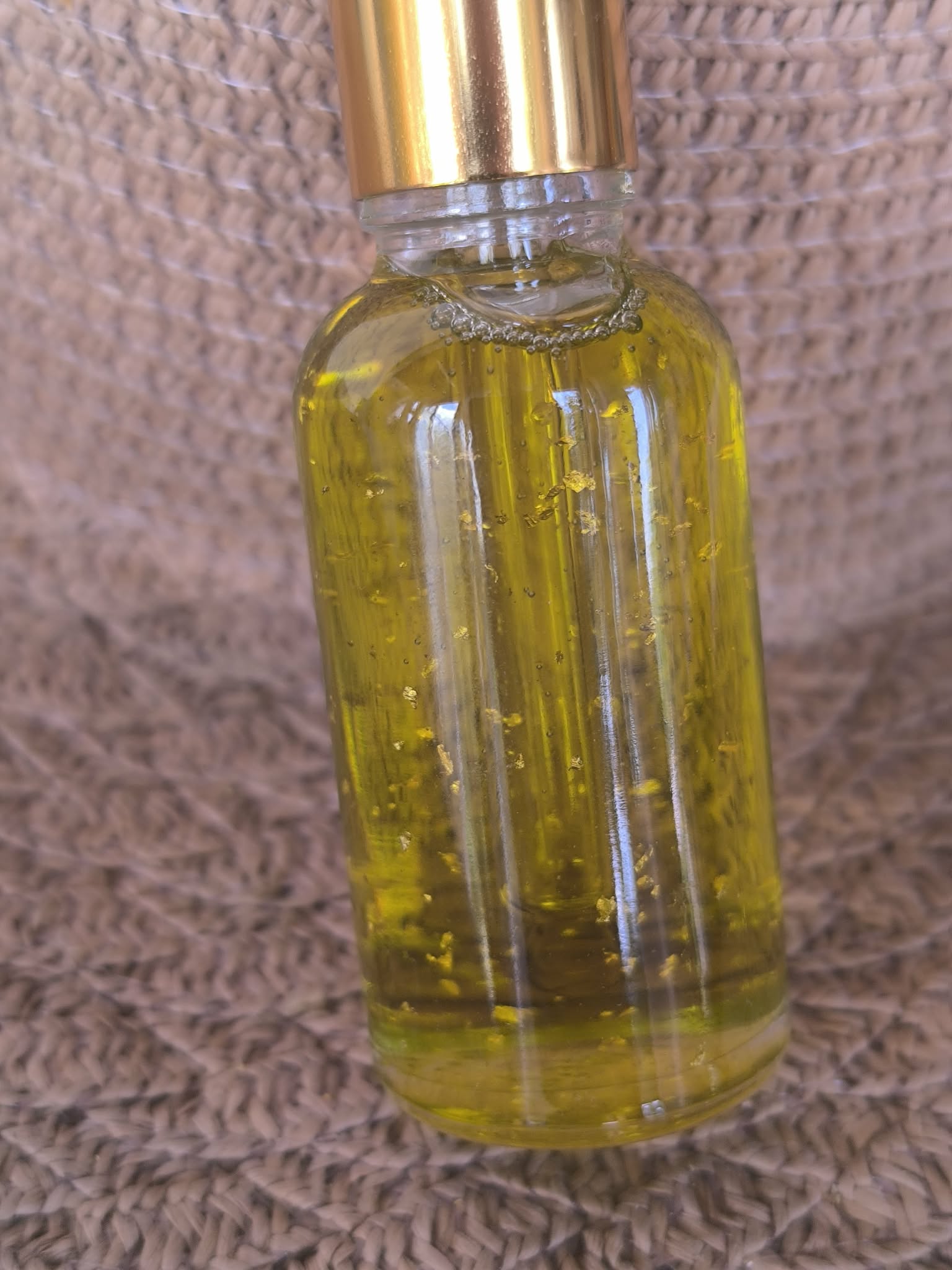 маслен извлек от люляк в зехтин със злато 24к и бакучиол